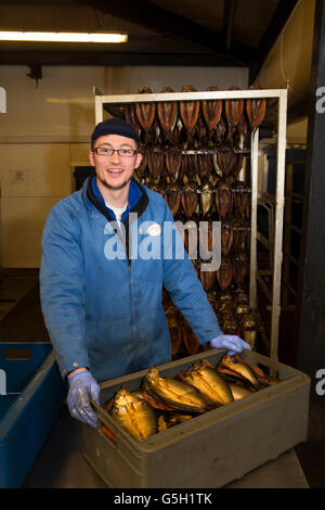 UK, England Northumberland, Craster, L Robson & Son,  Smokehouse, Chris Graham boxing kippers Stock Photo