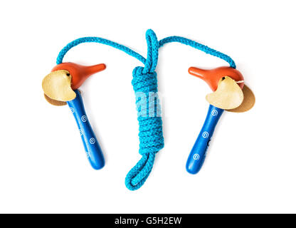 New skipping rope on the white background. Leisure activity. Healthy lifestyle. Jumprope scene. Stock Photo