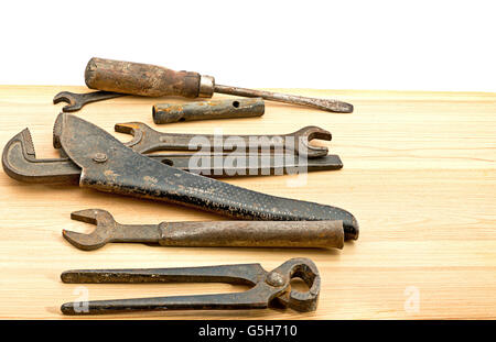 old used tools on the wooden desk Stock Photo
