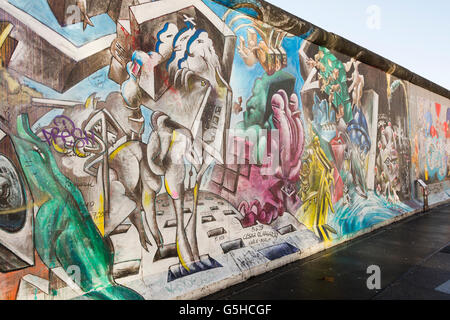 Sections of the Berlin Wall, now covered in street art at the East Side Gallery in Berlin, Germany Stock Photo