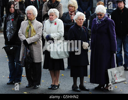 Mourners stand outside church during the funeral service of Sergeant Gareth Thursby at Holy Trinity Church, Skipton. Stock Photo