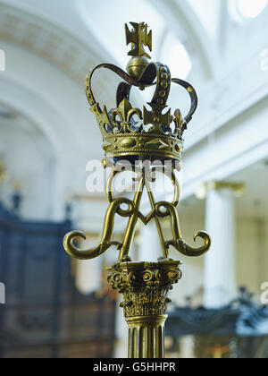 St Magnus the Martyr church in the City of London. Candlesticks with crown and AR, Queen Anne's cypher. Stock Photo
