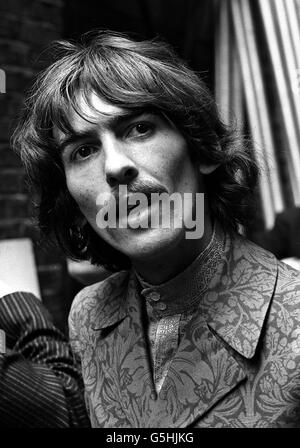 George Harrison, of the Beatles, at the EMI Studios, St. John's Wood, London. He has been rehearsing at the EMI Studios in St. John's Wood, London, for the group's appearance in the international television programme 'Our World'. They have written a song 'All You Need is Love' especially for the programme. Stock Photo