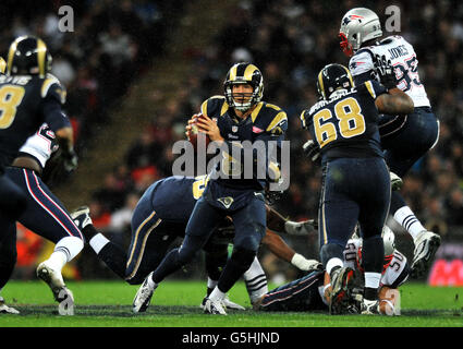 Tennessee Titans Cortland Finnegan intercepts a St. Louis Rams Sam Bradford  pass in the first quarter