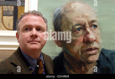 Colin Davidson, RUA President, beside his work of Mark Knopfler at the 131st annual Royal Ulster Academy Exhibition, at the Ulster museum, which was previewed today, the Exhibition opens to the public from October 19th-November 18th. Stock Photo