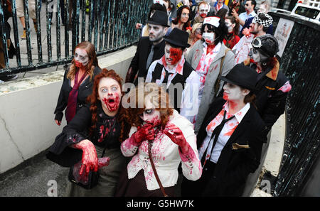 Participants parade through the streets as they take part in the annual 'Beach Of The Dead' Brighton Zombie Walk in Brighton, East Sussex. PRESS ASSOCIATION Photo. Picture date: Saturday October 20, 2012. Photo credit should read: Clive Gee/PA Wire Stock Photo