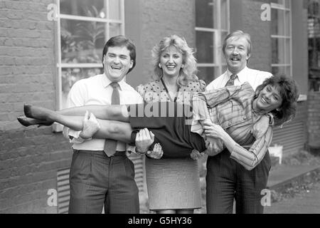 Presenter Kathy Tayler (front), 28, joins the line-up of TV-am presenters, from left: Richard Keys, Jayne Irving and Mike Morris. Stock Photo