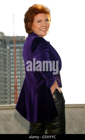 TV personality Cilla Black poses for photographs during the launch of a new series of her dating show 'Blind Date', on the balcony of the Dorchester Hotel in London. The show begins its new run on Saturday 10 November 2001 at 7pm on ITV. Stock Photo