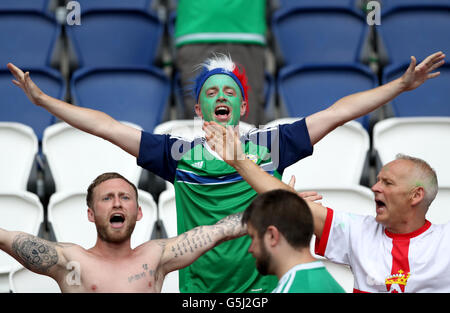 Northern Ireland fans cheer the team on stage during the homecoming ...