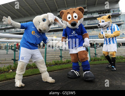 Peterborough United mascot Peter Burrow, Leicester City mascot Filbert Fox and Huddersfield Town's Terry The Terrier (left to right) in the parade ring before the Football League Mascot Race, in support of Prostate Cancer UK. Stock Photo