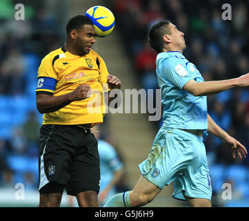 Soccer - FA Cup - First Round - Coventry City v Arlesey Town - Ricoh Arena. Coventry City's Callum Ball and Arlesey Town's Shane Blackett during the FA Cup First Round match at the Ricoh Arena, Coventry. Stock Photo