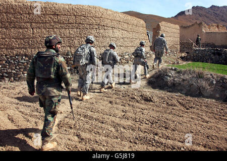 Afghan National Army and U.S. Soldiers in the village of Akbar Kheyl, Afghanistan. Stock Photo