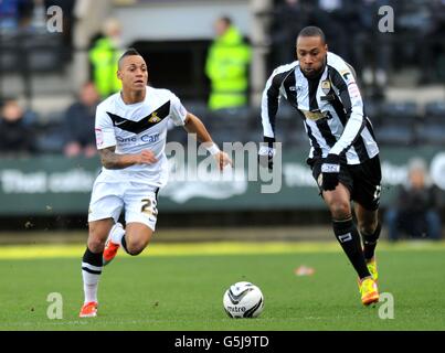 Notts County's Yoann Arquin (right) and Doncaster Rovers' Kyle Bennett battle for the ball during the npower League One match at Meadow Lane, Nottingham. Stock Photo