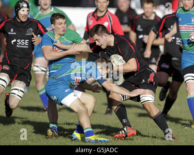 Biggar's Andrew Cairns (right) vies with Hamilton's Steven Turnbull (left) and Andy Wilson in a RBS National League match at Hartree Mill, Biggar, Lanarkshire. Stock Photo