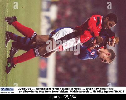 30-DEC-95 .... Nottingham Forest v Middlesbrough .... Bryan Roy, Forest gets an elbow in the face from Steve Vickers, Middlesbrough Stock Photo