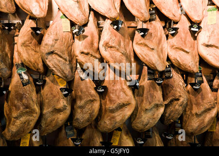 Horizontal view of traditional Iberian hams for sale in Majorca. Stock Photo