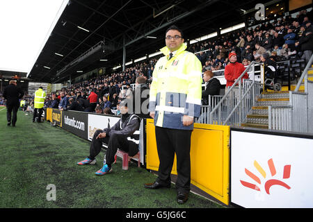 Soccer - Fulham - Craven Cottage - Fulham Security and Steward Images. Fulham stewards help fans around the stadium on match day Stock Photo