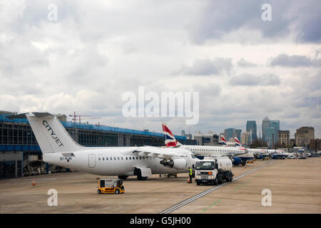 Horizontal view of aircraft waiting at the departure gates at London City Airport. Stock Photo