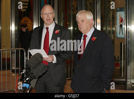 BBC director general George Entwistle (left) stands alongside Chairman of the BBC Trust Lord Patten outside BBC Broadcasting House, London, as he announced his resignation over the 'unacceptable' Newsnight broadcast which wrongly implicated a senior former Conservative in a child abuse scandal. Stock Photo