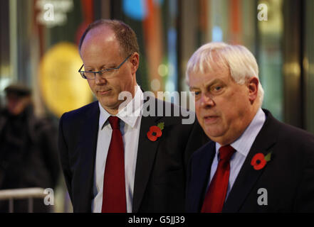 BBC director general George Entwistle (left) looks on as Chairman of the BBC Trust Lord Patten speaks to the media outside BBC Broadcasting House, London, after Mr Entwistle announced his resignation over the 'unacceptable' Newsnight broadcast which wrongly implicated a senior former Conservative in a child abuse scandal. Stock Photo