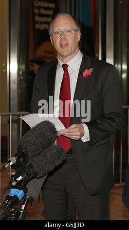 BBC director general George Entwistle (left) stands alongside Chairman of the BBC Trust Lord Patten outside BBC Broadcasting House, London, as he announced his resignation over the 'unacceptable' Newsnight broadcast which wrongly implicated a senior former Conservative in a child abuse scandal. Stock Photo