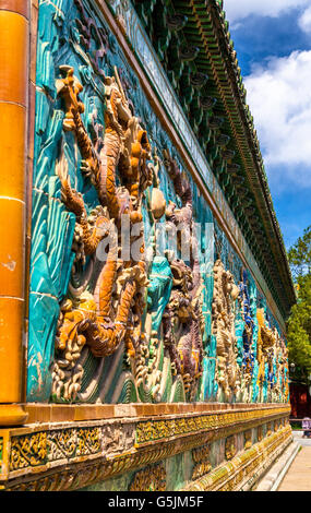 The Nine-Dragon Wall at Beihai park in Beijing, China Stock Photo