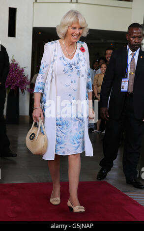 The Duchess of Cornwall is sung to by dancers as she leaves the Airways Hotel in Port Moresby, Papua New Guinea, during the first leg of a Diamond Jubilee Tour taking in Papua New Guinea, Australia and New Zealand. Stock Photo