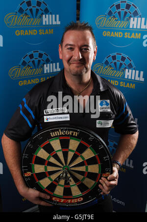 Darts - Grand Slam of Darts Promotion Event - Wolverhampton. Dean Winstanley pictured at the William Hill shop in Wolverhampton Stock Photo