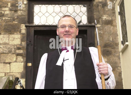 The newly appointed Bishop of Shrewsbury, Alan Smith, poses outside Westminster Abbey, following a service inside the abbey conducted by the Archbishop of Canterbury, Dr George Carey. Stock Photo