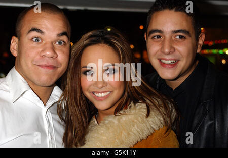 Three members of the pop band Hear'Say arrive at the Odeon Leicester Square in London, for the world premiere of Lord of the Rings: The Fellowship of the Ring. (L-R) Danny Foster, Myleene Klass and Noel Sullivan. lotrgal Stock Photo