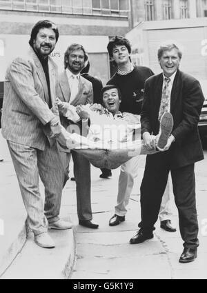 BBC Radio One Breakfast Show DJ Mike Smith (right) is joined by former presenters of the early-morning slot as the network celebrates its 20th anniversary. From left: Dave Lee Travis, Noel Edmonds, Tony Blackburn and Mike Read. Stock Photo