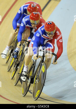 Great Britain's Jason Kenny (centre), Philip Hindes (front) and Ed Clancy (back) in qualifying during the team sprint during day one of the UCI Track Cycling World Cup at the Sir Chris Hoy Velodrome, Glagsow. Stock Photo