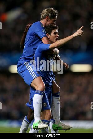 Chelsea's Emboaba Oscar (right) celebrates with team-mate Fernando Torres scoring his side's second goal of the game Stock Photo