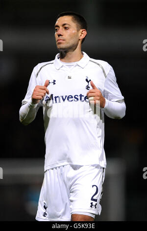 Tottenham Hotspur's Clint Dempsey carries his baby round the ground to take  the applause form the fans on the lap on honour. Spurs beat Sunderland 1:0  Stock Photo - Alamy