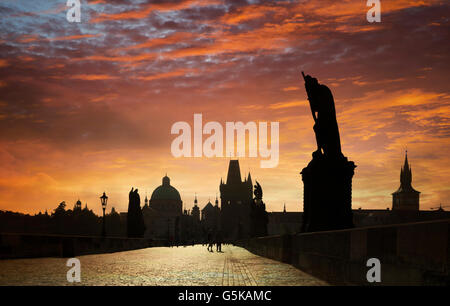 Silhouette of ornate buildings against sunset sky Stock Photo