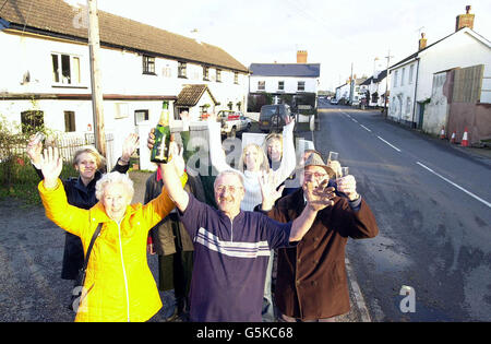 Residents of Tedburn St Mary in Devon celebrate after being named Village of the Year, in the Calor Gas and Daily Telegraph 2001 Great Britain Village of the Year Competition at a ceremony in central London. The Prince paid tribute to the richness and diversity of rural life as he presented the awards and praised rural villagers for enduring a year, which included the horrors of foot and mouth. See PA story ROYAL Prince. PA Photo : John Stillwell. Stock Photo