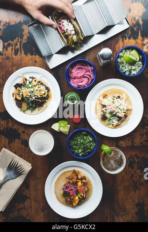 Caucasian man making tacos Stock Photo