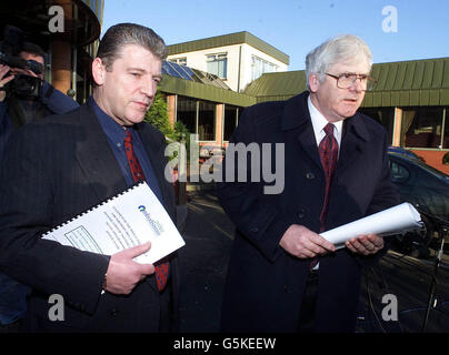 Stanley McCombe (left), who lost is wife in the Omagh bombing, with Micheal Gallagher, whose son died in the atrocity, after recieving the Omagh bombing report from Police Ombudsman Nuala O'Loan at an Omagh hotel. * ....Ms O'Loan claimed Chief Constable Sir Ronnie Flanagan's flawed judgment in the Omagh bomb inquiry significantly reduced the chances of catching the Real IRA killers. She said the detectives who headed the investigation had failed the 29 victims and their families and added that senior management in the Royal Ulster Constabulary had been defensive and uncooperative. Stock Photo