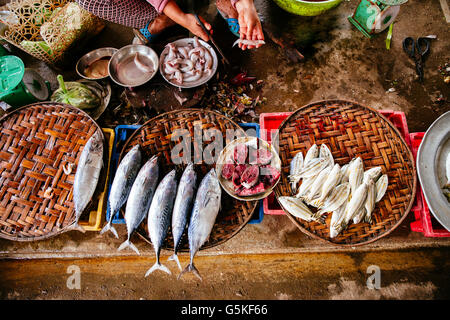 High angle view of vendor cleaning fish Stock Photo