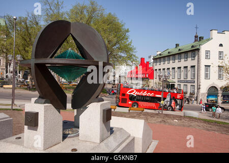 QUEBEC CITY - MAY 24, 2016: The UNESCO Monument, made of bronze, granite, and glass, commemorates Old Québec's designation as a Stock Photo