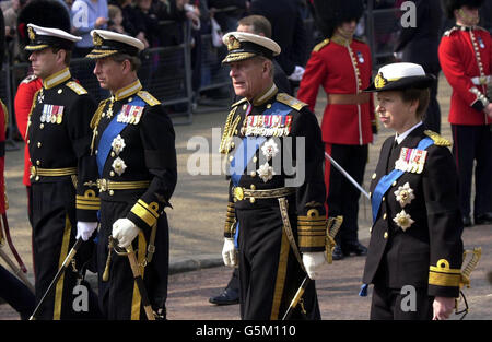 The royal entourage (left-right) The Duke of York, The Prince of Wales, The Duke of Edinburgh and The Princess Royal following the coffin of the Her Majesty Queen Elizebeth the Queen Mother in procession from the Queens Chapel, * St. James Palace to Westminster Hall as it passes in to Horseguards Parade. Stock Photo