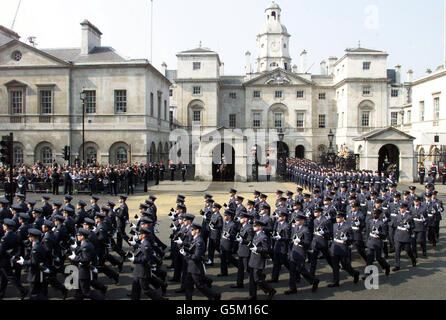 RAF personnel form part of the procession that escorts the coffin of Queen Elizabeth, the Queen Mother, as it passes into Whitehall from Horse Guards as it travels to Westminster Hall, where the it will lie-in state until her funeral at Westminster Abbey on Tuesday. Stock Photo