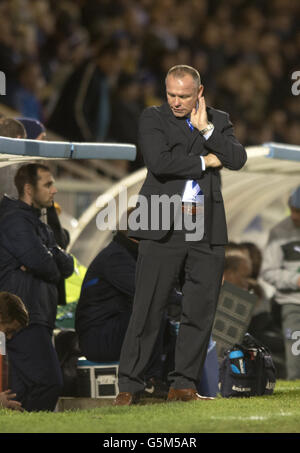Hartlepool United's new manager John Hughes stands dejected during the npower Football League One match at Victoria Park, Hartlepool. Stock Photo