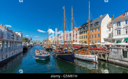 Excursion boat, Nyhavn canal, Copenhagen, Denmark Stock Photo