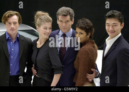 Stars of the film, Toby Stephens, Rosamund Pike, Pierce Brosnan, Halle Berry and Rick Yune during a photocall at Pinewood Studios, north of London for 'Bond 20', the working title for the latest film which starts production next week. Stock Photo