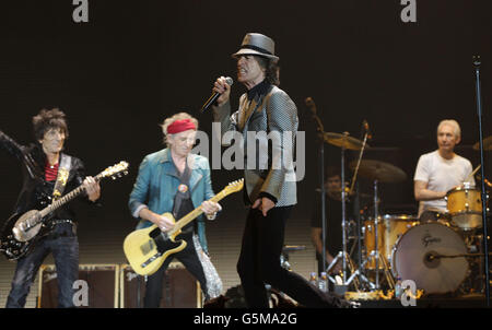 EDITORIAL USE ONLY : (left to right) Ronnie Wood, Keith Richards, Mick Jagger and Charlie Watts of The Rolling Stones performing at the O2 Arena in London, as part of their 50th anniversary series of concerts. Stock Photo
