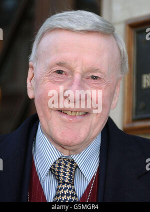 Veteran broadcaster Jimmy Young, knighted in the New Year Honours List, arrives for work on his regular Radio 2 show at Broadcasting House in London. * .... Sir Jimmy, 80, one of the best known figures on UK radio, said: 'I'm deeply honoured and I am indeed most grateful. This is an enormous honour and one that I share with five million listeners'. * 16/01/2002: Sir Jimmy Young announced that he is to step down at the end of 2002 after 28 years presenting his lunchtime BBC Radio 2 show. The 80-year-old broadcaster will move to a weekend show in 2003. Stock Photo