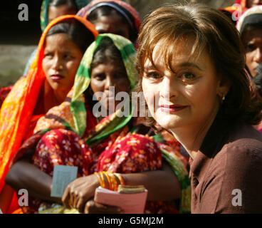 Britain's Prime Minister Tony Blair's wife Cherie accompanies her husband on a visit to villagers in Kelia, a village 40 km west of Dhaka, during three nation tour of South Asia. * The village is funded by the Bangladesh Rural Advancement Committee, the largest NGO in the world, with contributions from Britain's Department for International Development. Stock Photo