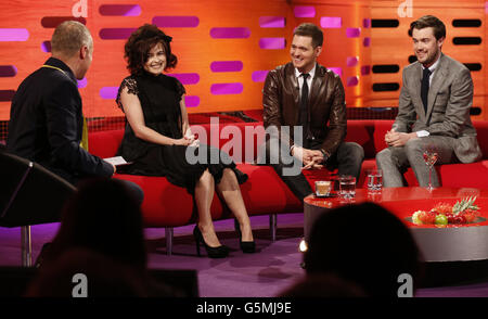 (left to right) Presenter Graham Norton, Helena Bonham Carter, Michael Buble, and Jack Whitehall during the filming of the Graham Norton Show at The London Studios, south London, to be aired on BBC One on Friday evening. Stock Photo