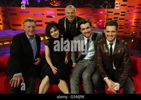 (left to right) Michael Palin, Helena Bonham Carter, Presenter Graham Norton, Jack Whitehall and Michael Buble, during the filming of the Graham Norton Show at The London Studios, south London, to be aired on BBC One on Friday evening. Stock Photo